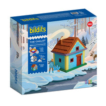 Load image into Gallery viewer, Bildits toy set packaging for 'The Chalet' with a winter scene illustration.