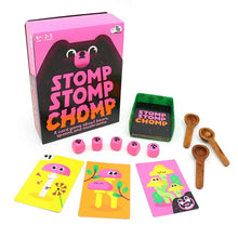 Load image into Gallery viewer, Stomp Stomp Chomp card game components including cards, dice, and wooden spoons on a white background.
