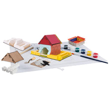 Load image into Gallery viewer, Children's playset with building blocks, paint, and tools on a white surface