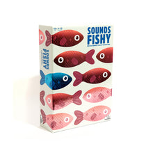 Load image into Gallery viewer, Box of &#39;Sounds Fishy&#39; game with colorful fish illustrations on a white background
