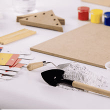 Load image into Gallery viewer, Children&#39;s play tools including a shovel and sand pail on a white surface with craft materials.
