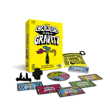 Load image into Gallery viewer, Cards vs. Gravity game set with box, cards, and accessories on a white background
