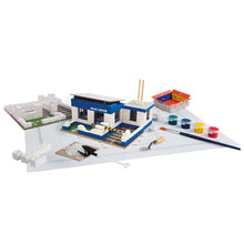 Load image into Gallery viewer, Model police station set with accessories on a white background
