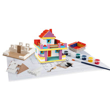Load image into Gallery viewer, Colorful toy building set with paint cans and brush on a white background
