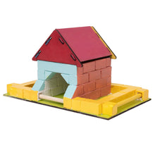 Load image into Gallery viewer, Colorful toy birdhouse building set on a white background
